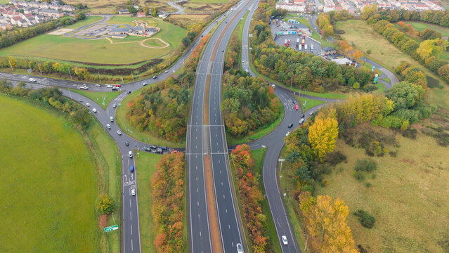 Aerial view of major highway overpass and traffic roundabout at Old Craighall junction near Edinburgh