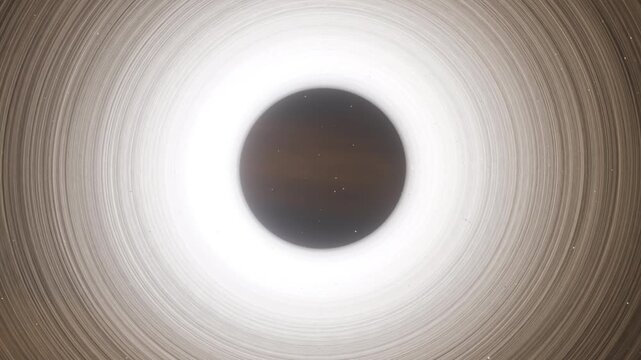 Camera descends toward the luminous disk of a black hole