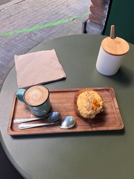 breakfast on the table cortado and cake