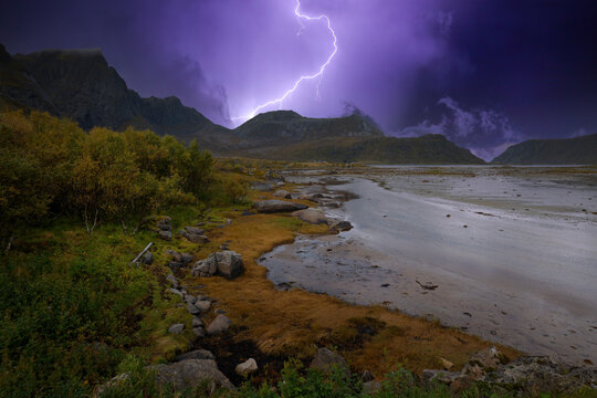 Dramatic thunderstorm with lightning over Morpheus Beach on Flakstadoya in the Lofoten Islands