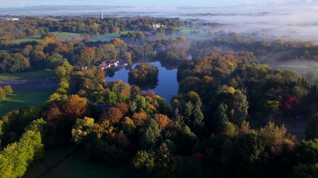Aerial view of Heaton Park Boating Lake Heaton Hall and BT Tower in Prestwich, Manchester
