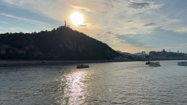 Sunset over Gellert Hill and Danube River in Budapest