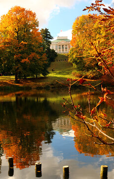 Palace on the Isle in Lazienki Park, Warsaw, Poland, reflected in a lake on a sunny autumn day