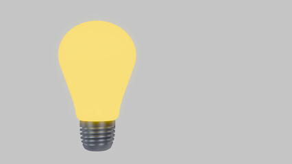 Glowing yellow light bulb on a minimal gray background with copy space © Fabricio
