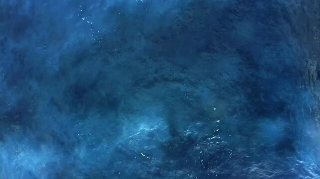 Drone shot, from above, surf at the beach of Praia de Santa Barbara, Ribeira Grande, Sao Miguel Island, Azores, Atlantic Ocean, Portugal
