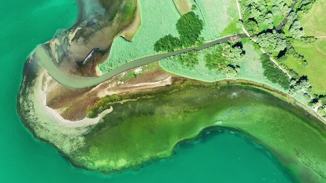 Aerial view, top down view of the mouth of the Stockacher Aach at low tide flowing into Lake &Uuml;berlingen. As a result of the deposits of entrained suspended matter and sediments from the inflow, the 