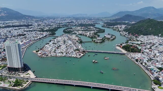 Cai river with Cau Tran Phu and Cau Xom Bong bridges in Nha Trang, Vietnam.