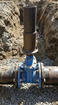 Gate valve installed in an open utility trench