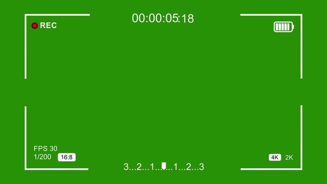 Camera viewfinder overlay with green screen background, digital recording interface, timecode, battery indicator, and focus frame for cinematic post-production and creative editing projects