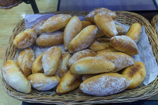Wicker Basket Filled with Traditional Mexican Bolillo Bread