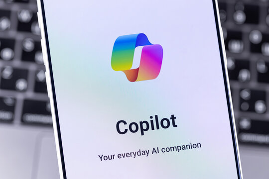 Microsoft Copilot logo mobile app on a screen smartphone iPhone. Microsoft Copilot is an artificial intelligence assistant for Microsoft 365 apps and services. Batumi, Georgia - October 3, 2026