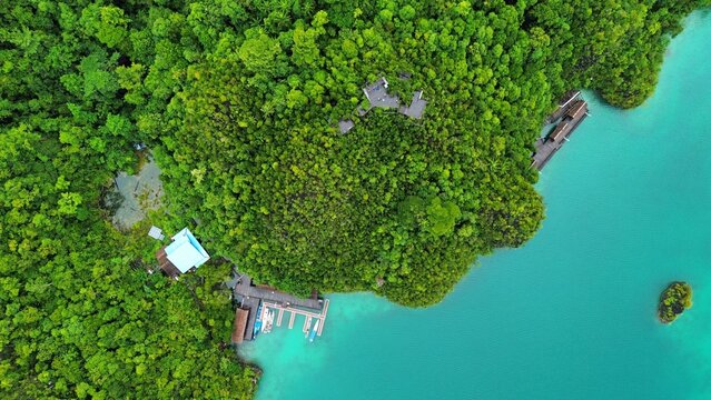 Iconic tropical paradise panorama of Pianemo islands with crystal clear emerald sea, Raja Ampat