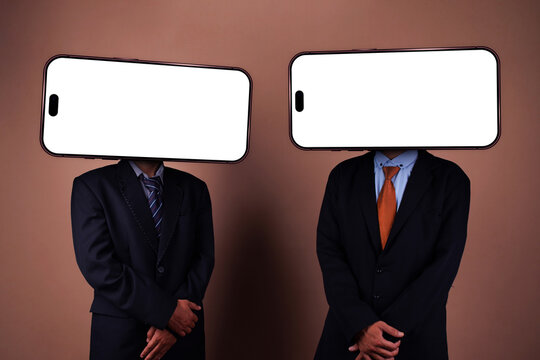 Two Businessmen Standing in Formal Pose with Empty Smartphone Display Heads on Brown Background