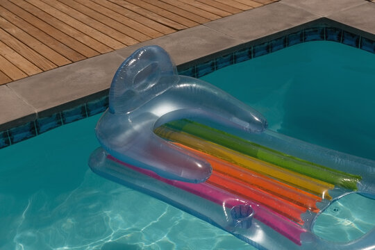 Inflatable tube floating in a swimming pool
