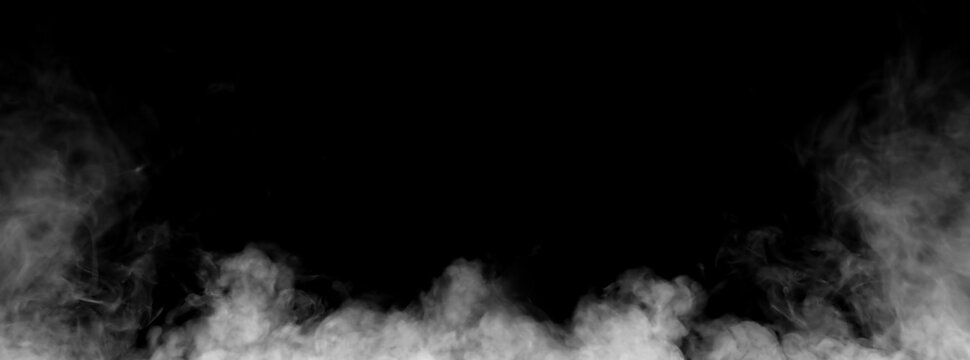 Dense white smoke or fog rising up along the sides and bottom on a black background. Concept of abstract vapor texture, atmospheric mist overlay, and dramatic special effect frame.