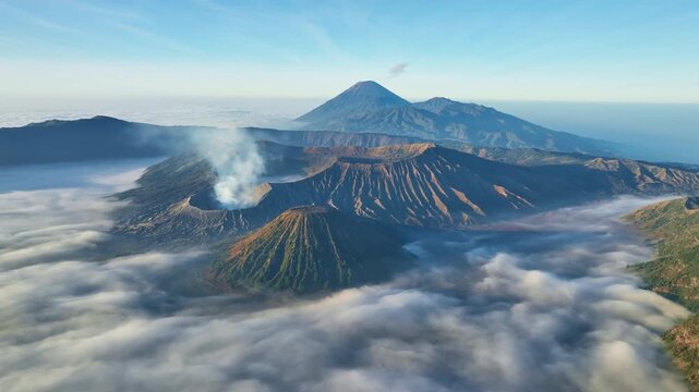 Aerial view of Amazing Mount Bromo volcano during sunrise sky,Beautiful Mountains Penanjakan in Bromo Tengger Semeru National Park,East Java,Indonesia.Nature landscape background,High quality video