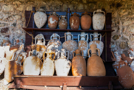 Ancient clay amphorae and ceramic pots display in Marmaris Castle, Turkey