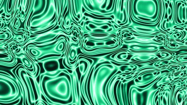 Emerald and teal fluid marble patterns slowly folding and swirling across the frame in a seamless loop