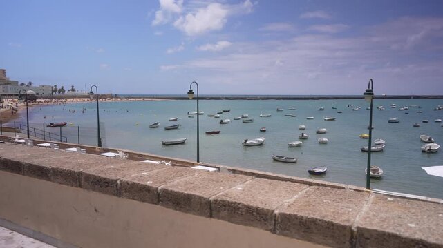 View of La Caleta beach and Castillo de Santa Catalina on a sunny day in Cadiz, Cadiz, Andalusia, Spain, Europe