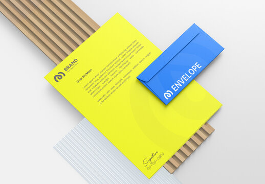 Letterhead and Blue Envelope Mockup Wooden Panel