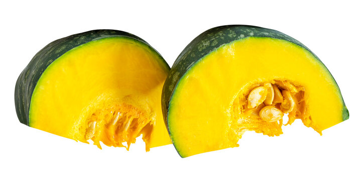 Green Japanese pumpkin fruit cut into two pieces or quarters or slices in stack isolated with clipping path in png file format