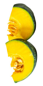 Green Japanese pumpkin fruit cut into two pieces or quarters or slices in stack isolated with clipping path in png file format