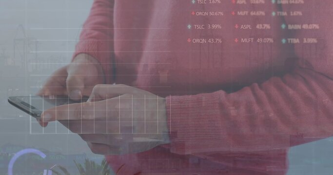 Tapping male hands in rose-pink sweater interacting with smartphone at workspace