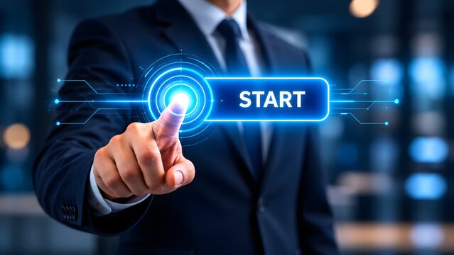 A professional businessman in a suit presses a glowing digital start button on a futuristic interface, symbolizing the beginning of a new project or technology.