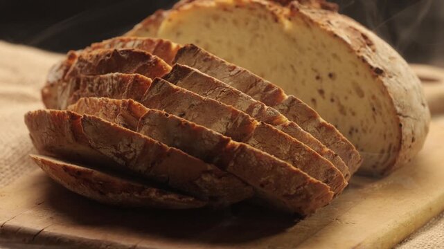 A round, rustic sourdough loaf with a crispy, crackled crust, dusted with flour and resting on crumpled brown wrapping paper in vintage style