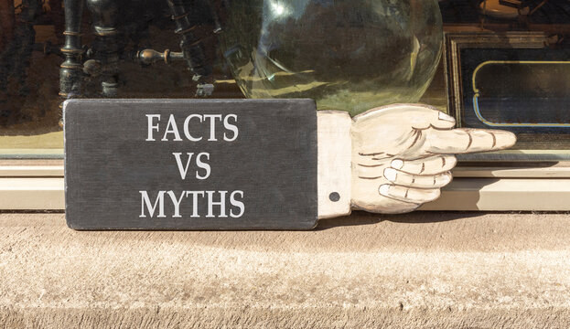 Facts vs versus myths words symbol. Concept words Facts vs Myths on beautiful black information sign. Beautiful shopfront background. Business and facts vs versus myths concept. Copy space.