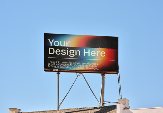 Mockup Of Customizable Rooftop Billboard Against Blue Sky