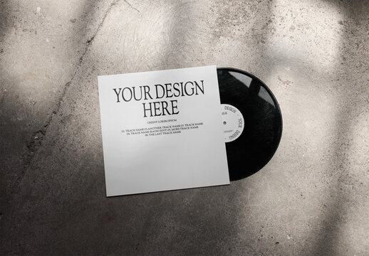 Customizable LP Sleeve With Black Vinyl Record On Concrete Floor