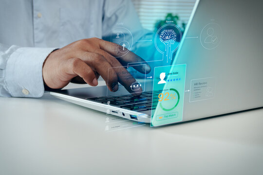 HR manager using laptop with AI recruitment and candidate auto screening interface, showing match score, candidate profile, and hiring workflow overlay, concept of smart HR technology.