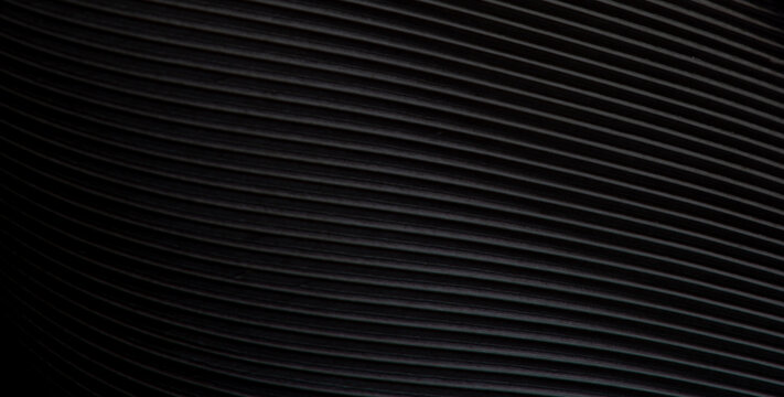 Black Diagonal Corrugated Line Texture Surface Background Full Frame,Black and white embossed texture of parallel lines,plastering of white concrete wall in seamless black line embossed patterns for 