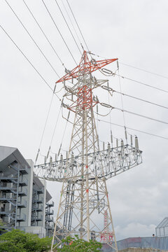 Electricity Transmission Tower Against an Overcast Sky