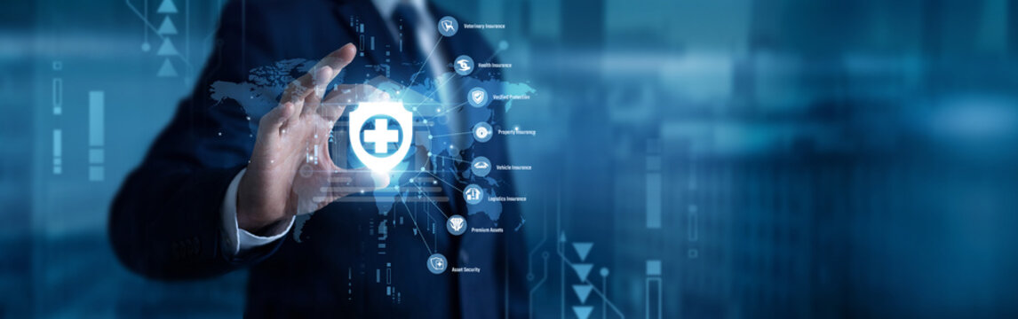An insurance consultant hand raised and fingers are touching a glowing Insurtech digital network processing digital policy claim. Smart protection tech platform .