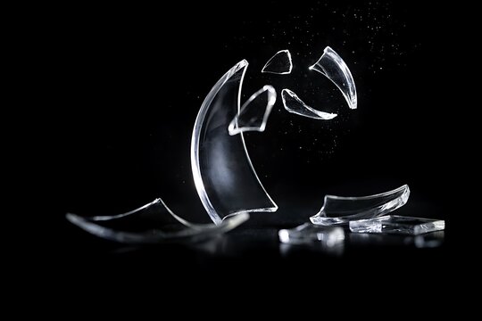 Cracked glass debris flying darkness high resolution picture