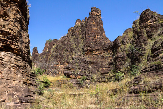Jagged sandstone pinnacles of the Sindou Peaks under a blue sky, Cascades Region, Banfora, Burkina Faso