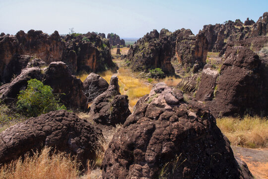 Rounded dark rocks and corridors of the Sindou Peaks, Cascades Region, Banfora, Burkina Faso
