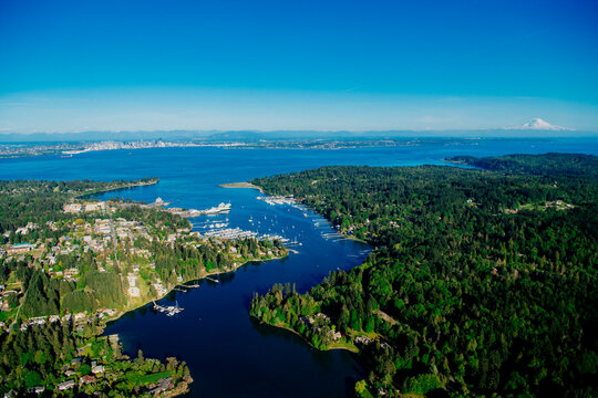Aerial view of Bainbridge Island's Eagle Harbor marina with seattle