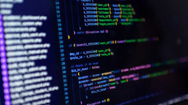 PHP backend source code and session handling script with database query on computer screen