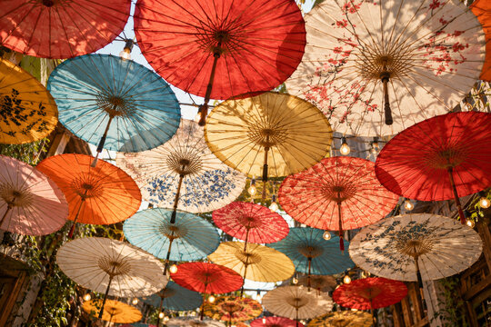 Colorful hanging paper parasols