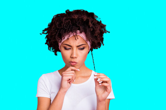Close-up portrait of her she nice-looking charming cute shine attractive lovely disappointed discontent wavy-haired girl looking at damaged curls isolated over pink pastel background
