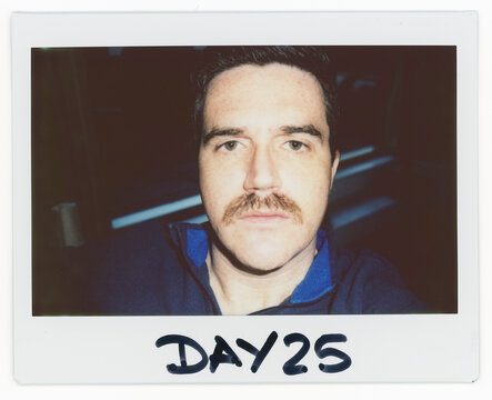 Man With a Moustache Takes Large Format Instant Picture at Home