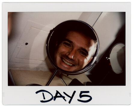 Man With Moustache Looks at Mirror on Day Five of Activity