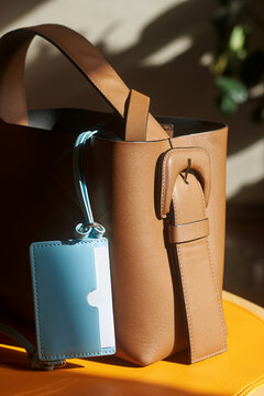 Bag with blue wallet placed at home