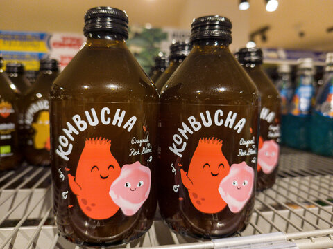 14 July 2026, Selva di Val Gardena, Italy. Kombucha Rose Blend Bottles Displayed on a Shop Shelf