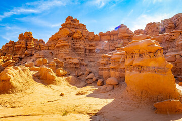 Towering sandstone cliffs and hoodoos at Goblin Valley © PhotoSpirit