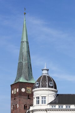 The tower of the Wormhus building and the cathedral in Aarhus, Denmark