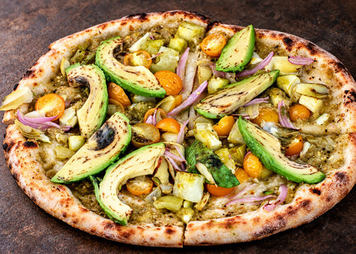 Vegetable Pizza with Avocado, Artichokes, Yellow Tomatoes and Red Onion